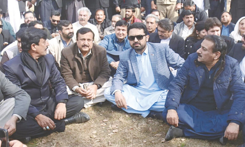 KHYBER Pakhtunkhwa Chief Minister Sohail Afridi and other PTI leaders stage a sit-in outside the Supreme Court.&mdash;Mohammad Asim/White Star