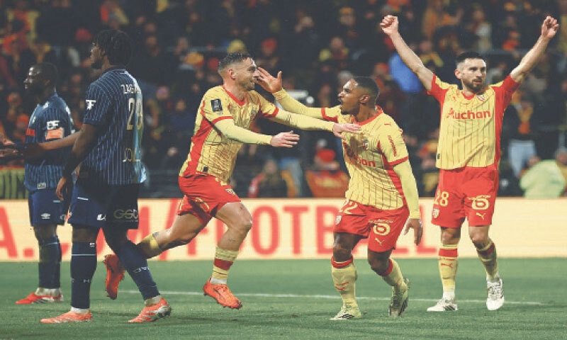 LENS: RC Lens&rsquo; Ruben Aguilar (C) celebrates after scoring during the Ligue 1 match against Le Havre AC at the Stade Bollaert-Delelis.&mdash;Reuters
