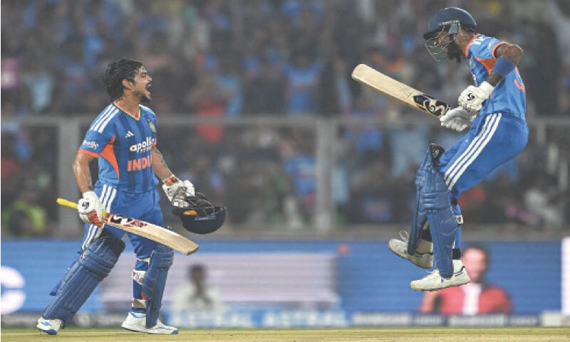 THIRUVANANTHAPURAM: India&rsquo;s Ishan Kishan (L) celebrates with Hardik Pandya after completing his century during the fifth Twenty20 International against New Zealand at the Greenfield International Stadium on Saturday.&mdash;AFP