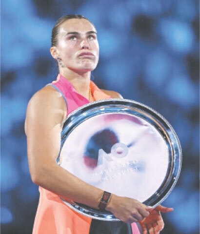 BELARUS’ Aryna Sabalenka looks on as she holds the runner-up trophy.—Reuters