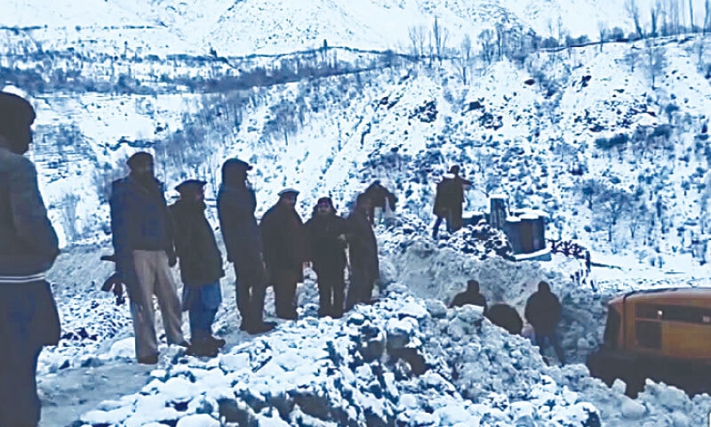 Government machinery in Gilgit-Baltistan clears a snow avalanche blocking the road from Gorikot to the Chilim area of Astore district.&mdash;Dawn