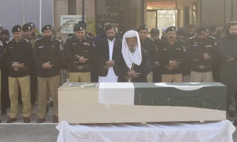 Funeral prayers are offered with honours for a police constable that was martyred in KP’s Lakki Marwat on Wednesday. — via Ghulam Mursalin Funeral prayers are offered with honours for a police constable that was martyred in KP’s Lakki Marwat on Wednesday. — via Ghulam Mursalin