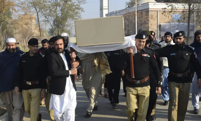 Funeral prayers are offered with honours for a police constable that was martyred in KP’s Lakki Marwat on Wednesday. — via Ghulam Mursalin Funeral prayers are offered with honours for a police constable that was martyred in KP’s Lakki Marwat on Wednesday. — via Ghulam Mursalin