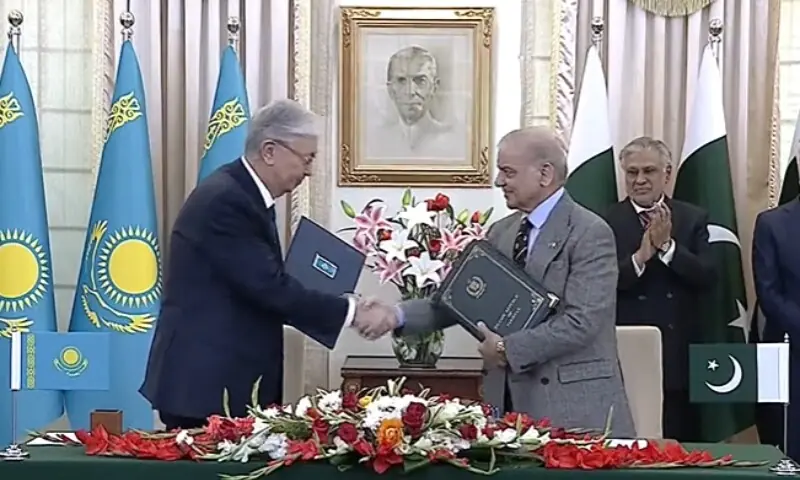 Prime Minister Shehbaz Sharif and Kazakhstan President Kassym-Jomart Tokayev shake hands at a joint press conference held on February 4. &mdash; Screengrab via PTV