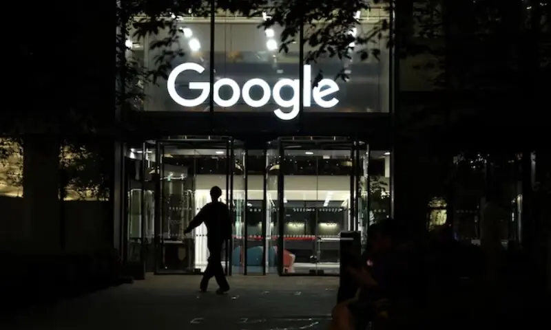 A pedestrian walks past the Google offices in London, Britain on Aug 14, 2025. &mdash;Reuters/File