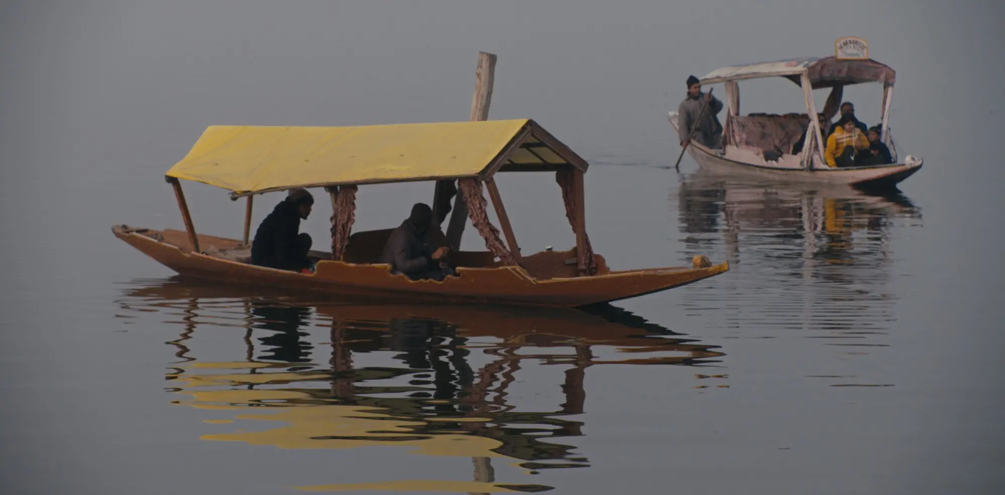 A still of traditional Kashmiri shikaras from the movie. Photo: Arfat Sheikh/Daffodil Studios