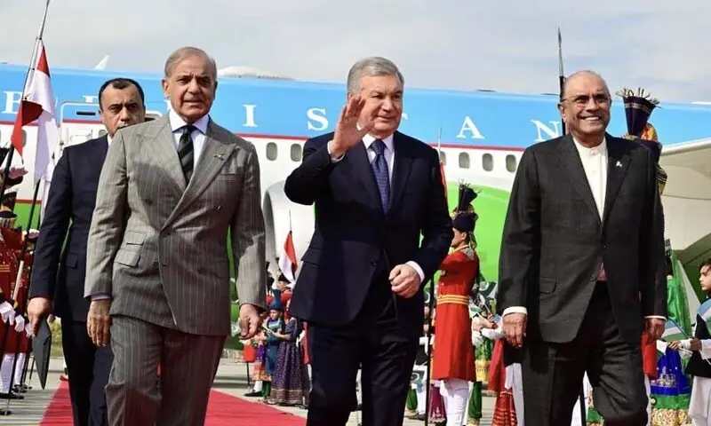 Prime Minister Shehbaz Sharif and President Asif Ali Zardari receive Uzbek President Shavkat Mirziyoyev at Nur Khan Airbase in Islamabad on February 5. &mdash; Photo courtesy President&rsquo;s Secretariat/ X