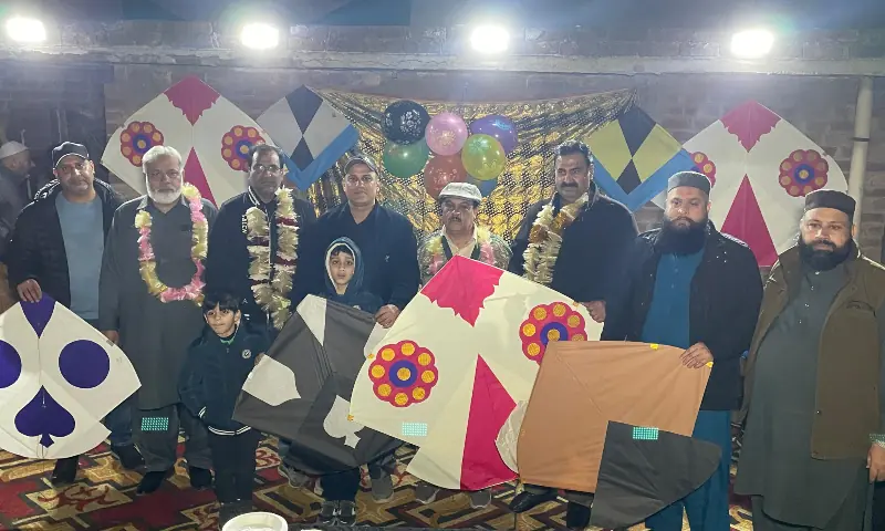 People hold kites celebrate first night of Basant Festival in Lahore. — photo via Murtaza Ali People hold kites celebrate first night of Basant Festival in Lahore. — photo via Murtaza Ali