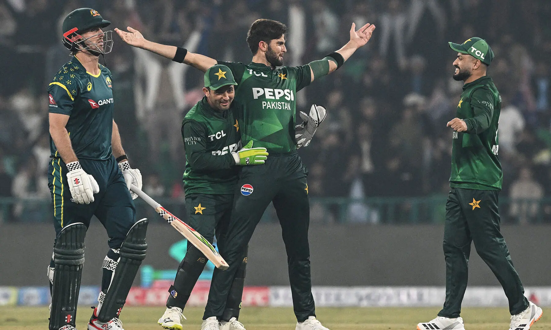 Pakistan’s Shaheen Shah Afridi (2R) celebrates with teammates after taking the wicket of Australia’s captain Mitchell Marsh (L) during the third T20 international cricket match between Pakistan and Australia at the Gaddafi Stadium in Lahore on February 1. — AFP Pakistan’s Shaheen Shah Afridi (2R) celebrates with teammates after taking the wicket of Australia’s captain Mitchell Marsh (L) during the third T20 international cricket match between Pakistan and Australia at the Gaddafi Stadium in Lahore on February 1. — AFP
