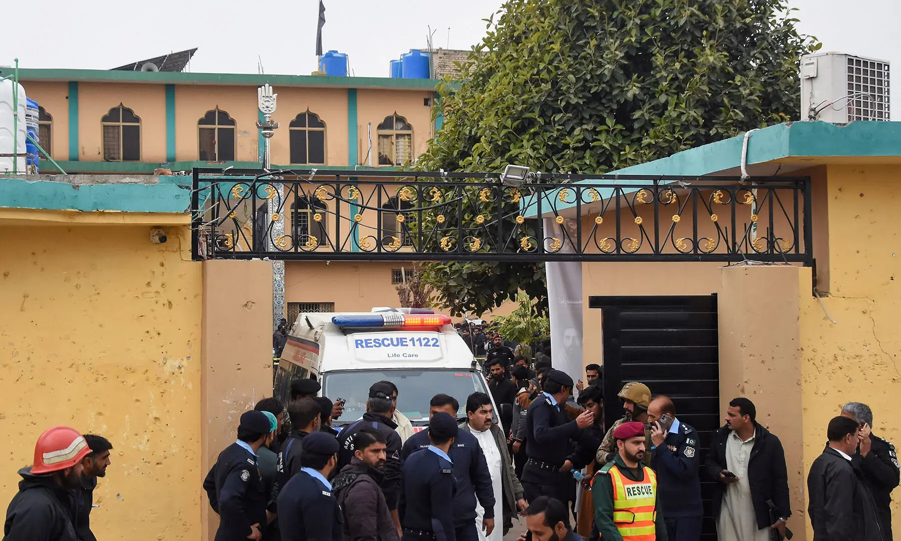 An ambulance evacuates casualties after a deadly explosion at Khadijah-tul-Kubra imambargah in Islamabad on February 6. &mdash; Reuters