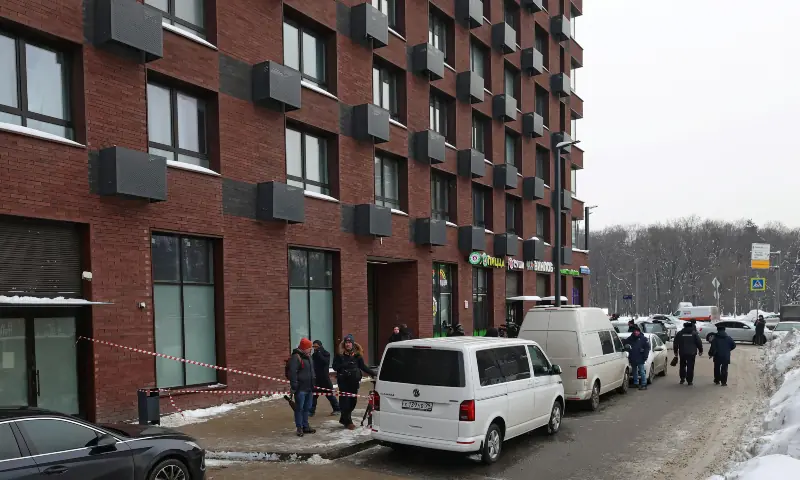 Law enforcement officers and journalists work outside a residential building where the assassination attempt on Russian Lieutenant General Vladimir Alexeyev took place in Moscow, Russia on February 6, 2026. &mdash; Reuters