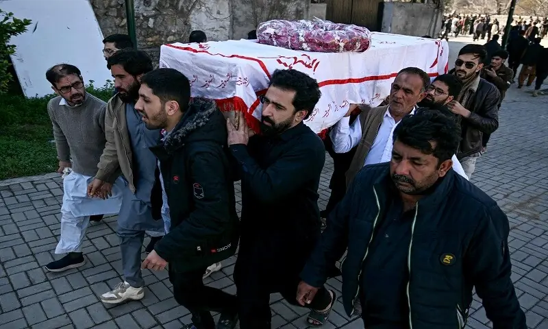 Mourners carry the coffin of a victim of the Islamabad imambargah attack on Feb 7, 2026. &mdash; AFP