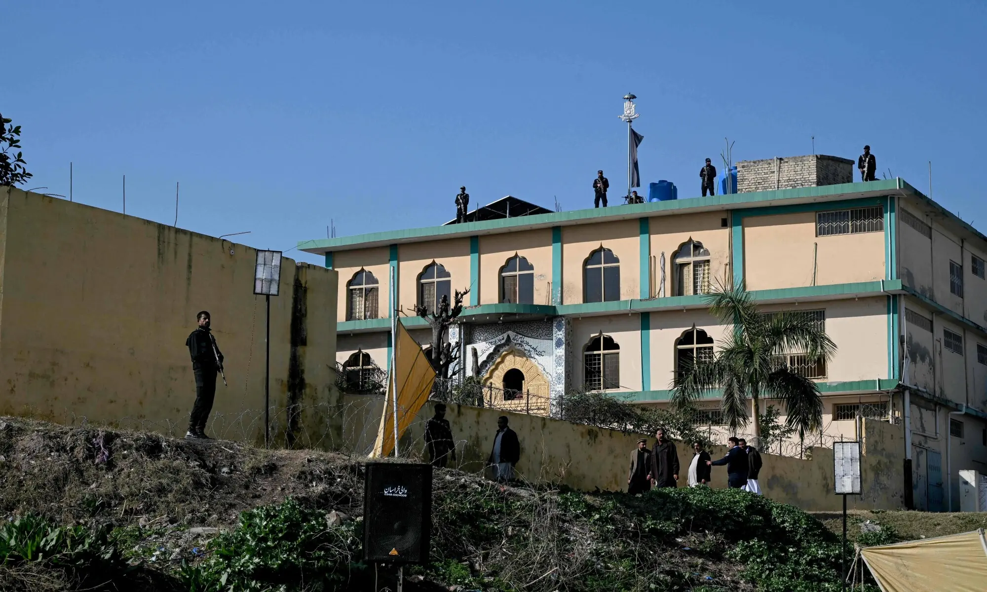 Security personnel cordon off the imambargah’s perimeter in Islamabad on February 7, 2026, a day after a suicide attack. — AFP