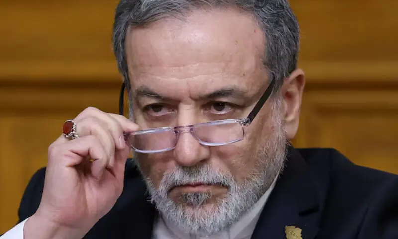 Iranian Foreign Minister Abbas Araqchi adjusts glasses during a press conference following talks with Russian Foreign Minister Sergei Lavrov in Moscow, Russia, December 17, 2025. &mdash; Reuters