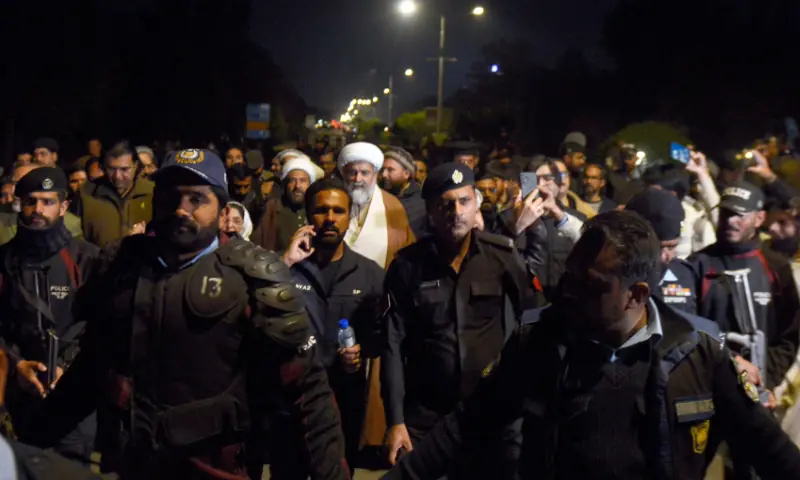 Senate Opposition Leader Allama Raja Nasir Abbas stands surrounded by police near Faisal Mosque in Islamabad on Feb 8, 2026. — Mohammad Asim/White Star Senate Opposition Leader Allama Raja Nasir Abbas stands surrounded by police near Faisal Mosque in Islamabad on Feb 8, 2026. — Mohammad Asim/White Star