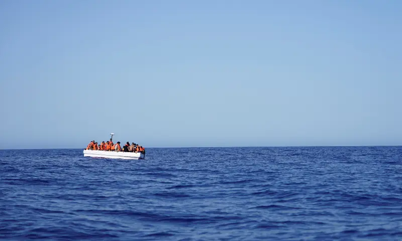 Migrants on a fibreglass boat wait to be assisted by NGO Open Arms rescue boat &ldquo;Astral&rdquo; in international waters south of Lampedusa, in the Mediterranean Sea on July 24, 2025. &mdash; Reuters/File