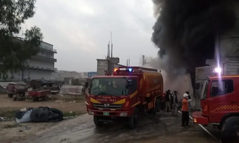 Fire trucks at the scene of a fire at a factory in Rawalpindi&rsquo;s Rawat Industrial Estate on Feb 9, 2026. &mdash; Photo provided by author