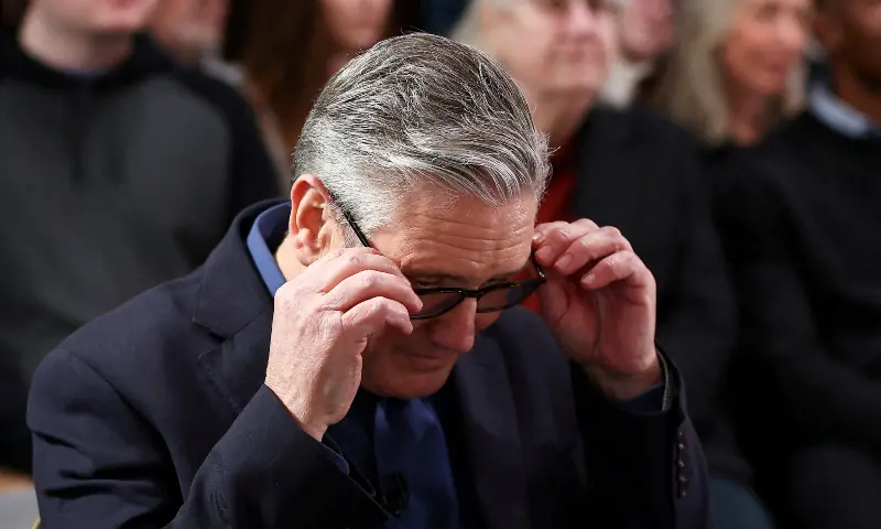 British Prime Minister Keir Starmer adjusts his glasses as he waits to deliver his speech in St Leonards, Britain on February 5, 2026. &mdash; Reuters