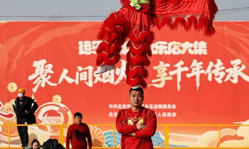 Folk artists perform at an outdoor market ahead of the Lunar New Year, in Beijing, China February 10, 2026. &mdash;Reuters