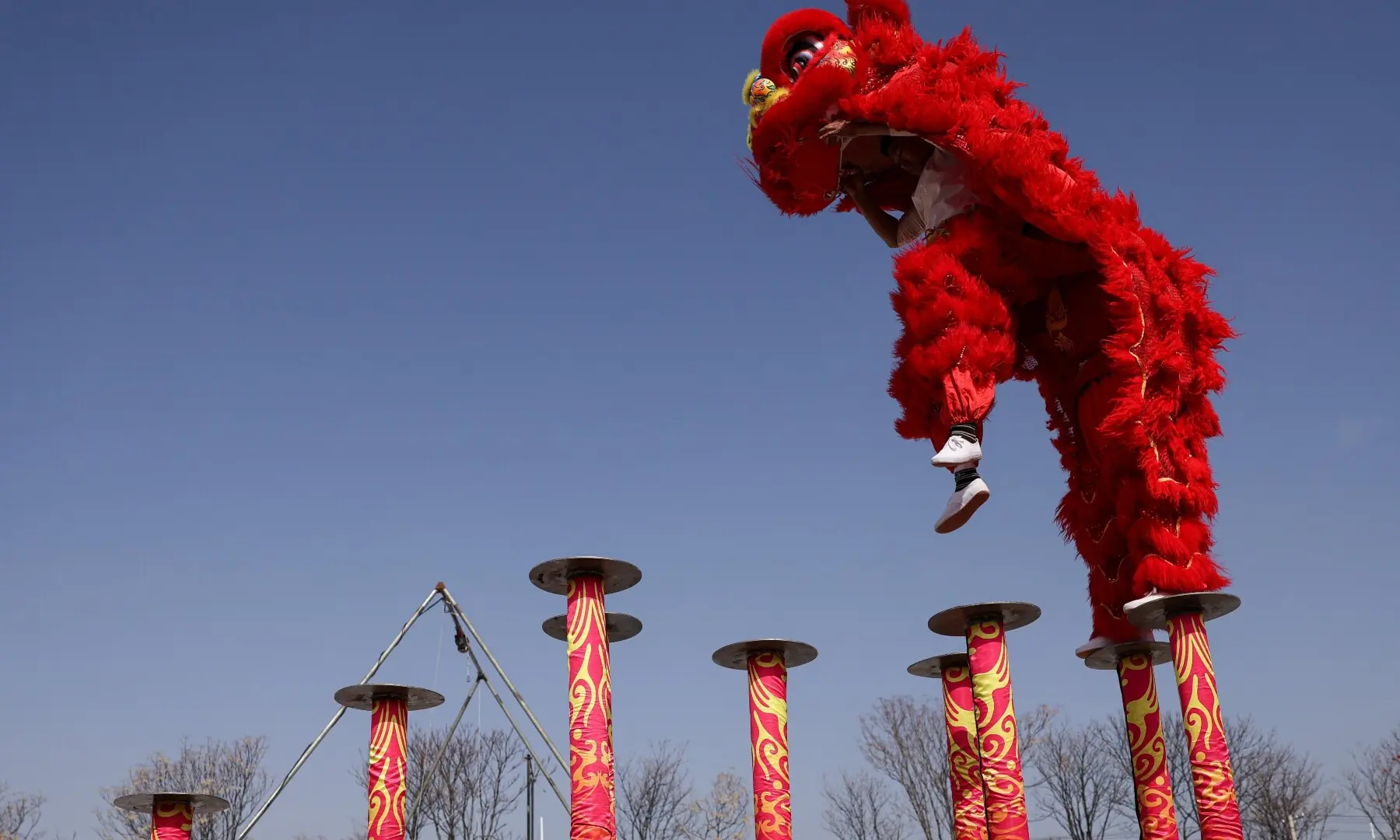 Folk artists perform lion dance at an outdoor market ahead of the Lunar New Year, in Beijing, China February 10, 2026. &mdash;Reuters