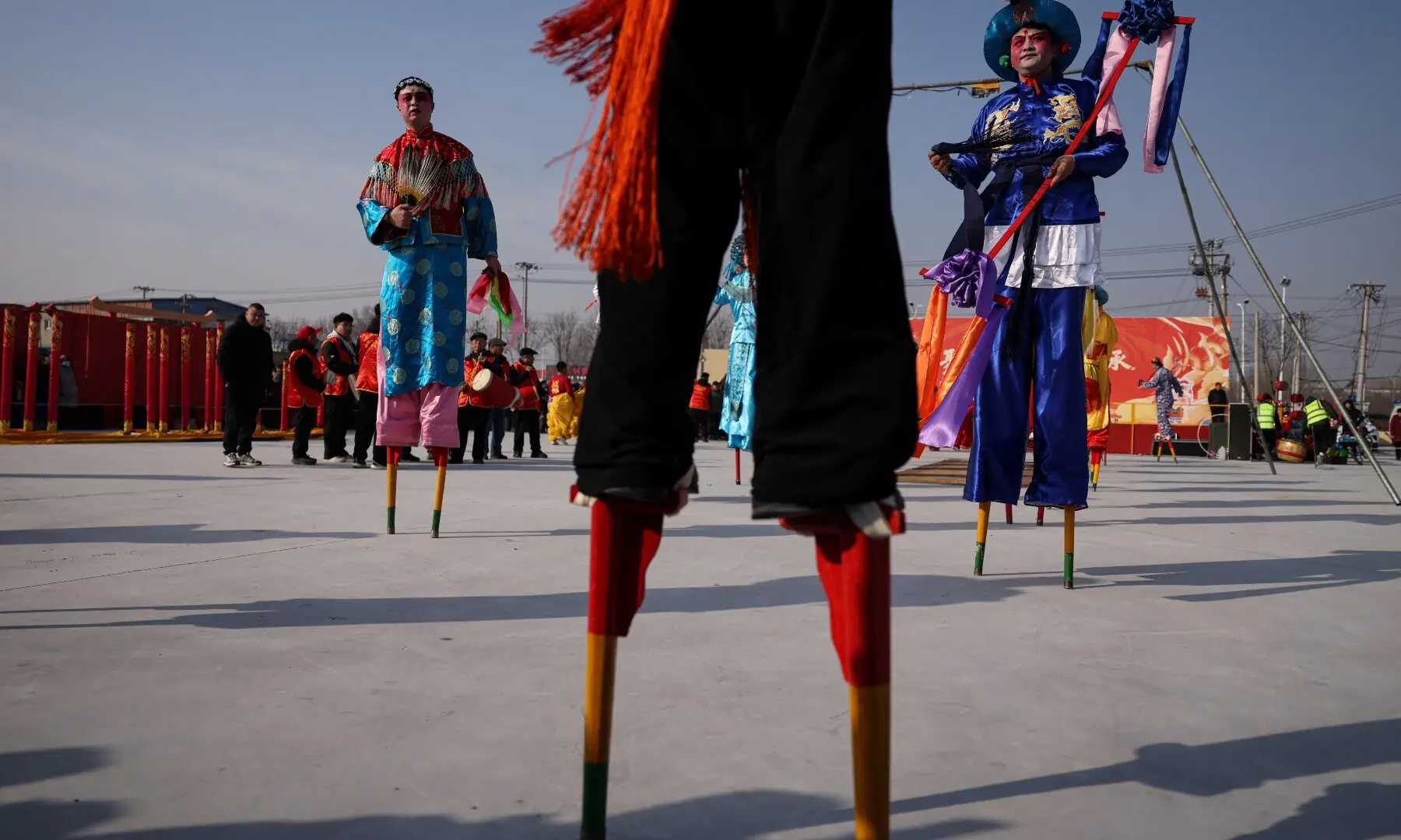 Folk artists perform at an outdoor market ahead of the Lunar New Year, in Beijing, China February 10, 2026. —Reuters
