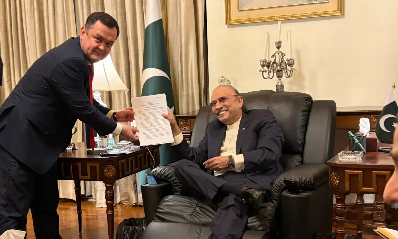 President Asif Ali Zardari accepts a letter from Uzbekistan’s President Shavkat Mirziyoyev in a meeting with Uzbek Ambassador to Pakistan Alisher Tukhtaev, in Islamabad on Feb 10. — photo via President’s Secretariat President Asif Ali Zardari accepts a letter from Uzbekistan’s President Shavkat Mirziyoyev in a meeting with Uzbek Ambassador to Pakistan Alisher Tukhtaev, in Islamabad on Feb 10. — photo via President’s Secretariat