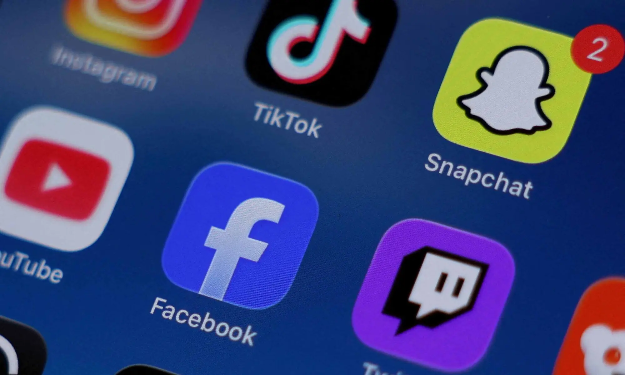 Instagram, TikTok, Snapchat, YouTube, Facebook, Twitch and Reddit applications are displayed on a mobile phone ahead of new law banning social media for users under 16 in Australia, in this picture illustration taken on December 9, 2025. — Reuters Instagram, TikTok, Snapchat, YouTube, Facebook, Twitch and Reddit applications are displayed on a mobile phone ahead of new law banning social media for users under 16 in Australia, in this picture illustration taken on December 9, 2025. — Reuters