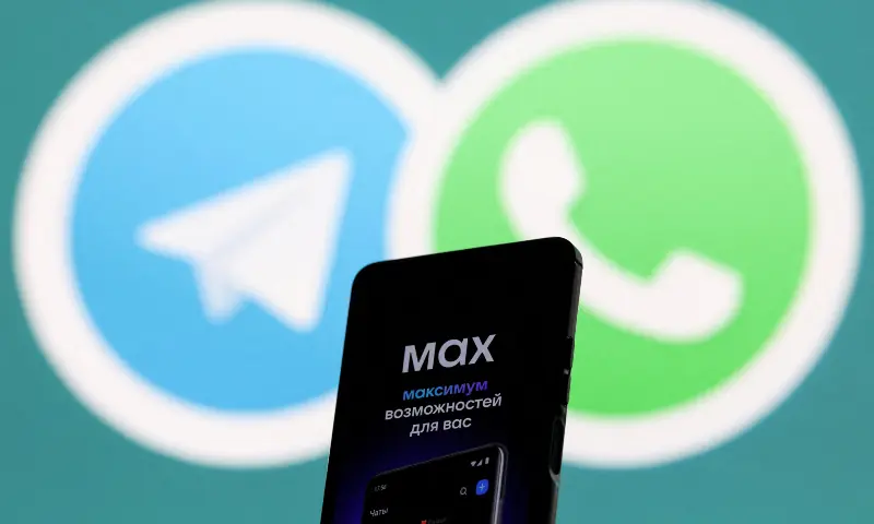 A web page of the Russian messenger app MAX displayed on a smartphone next to a screen showing the logo of WhatsApp and Telegram applications in this illustration taken on September 4, 2025. &mdash; Reuters/File