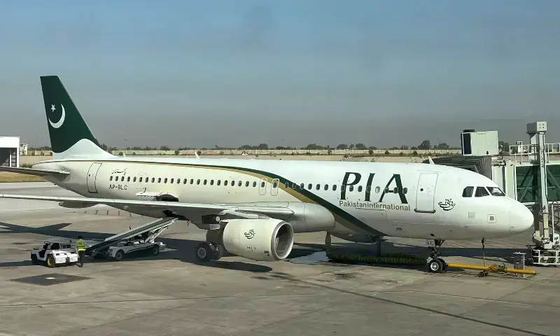 View of a Pakistan International Airlines (PIA) passenger plane, taken through a glass panel, at Islamabad International Airport on October 3, 2023. — Reuters/File View of a Pakistan International Airlines (PIA) passenger plane, taken through a glass panel, at Islamabad International Airport on October 3, 2023. — Reuters/File