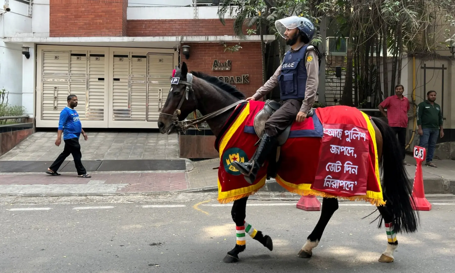 A police officer mounted on a horse patrols outside a polling station during the national election in Dhaka, Bangladesh, February 12, 2026. &mdash;Reuters