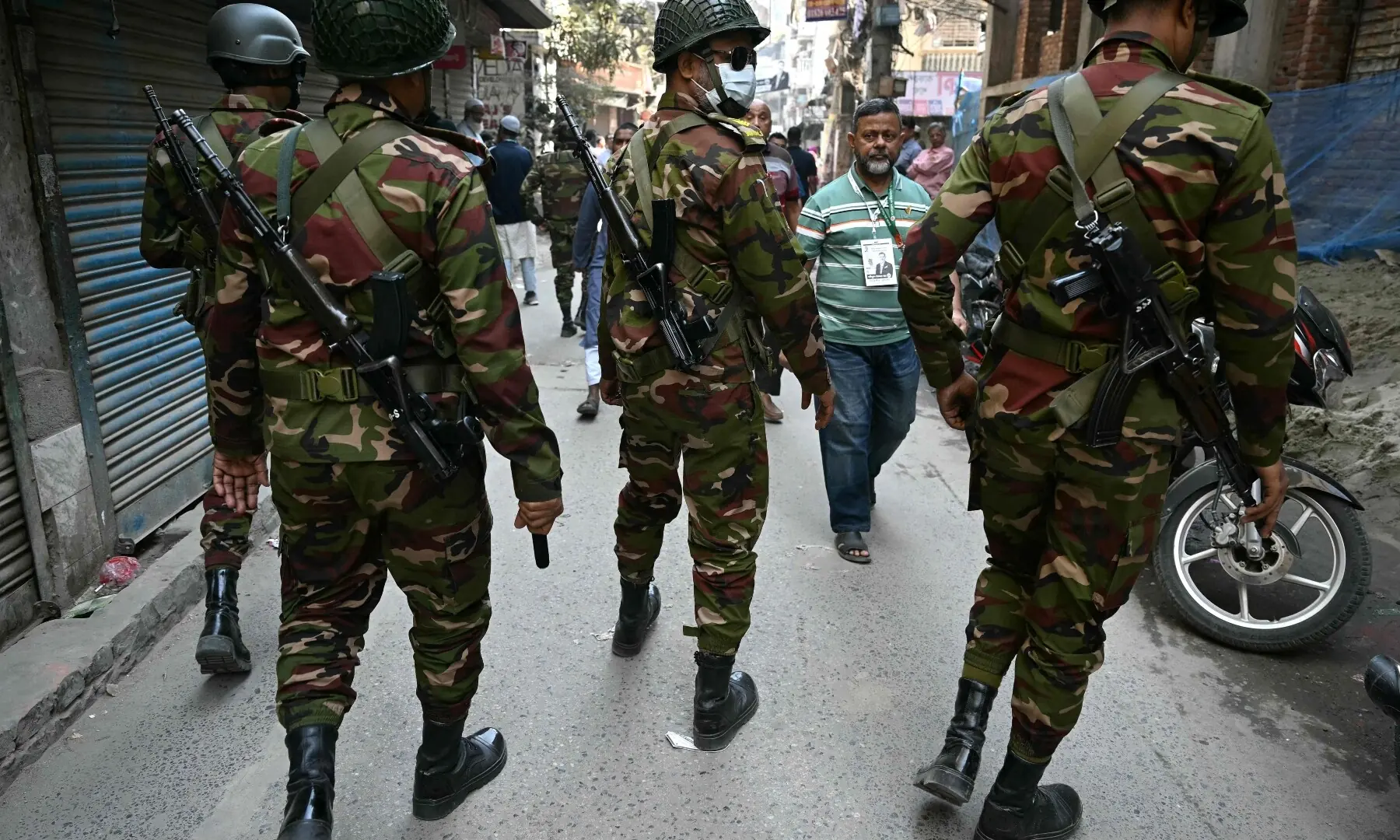 Bangladesh Army personnel patrol along a street outside a polling station during Bangladesh&rsquo;s general election in Dhaka on February 12, 2026. &mdash;Reuters
