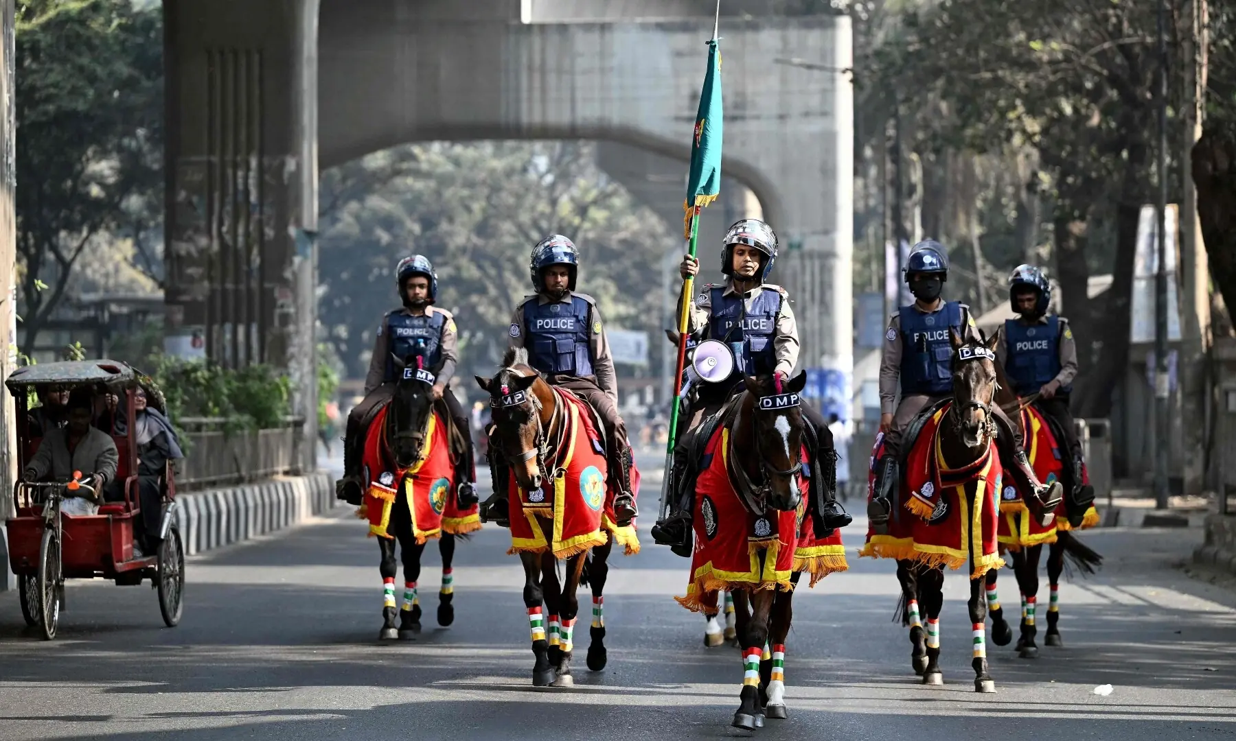 Police personnel patrol on horses along a street during Bangladesh&rsquo;s general election in Dhaka on February 12, 2026.  &mdash;AFP