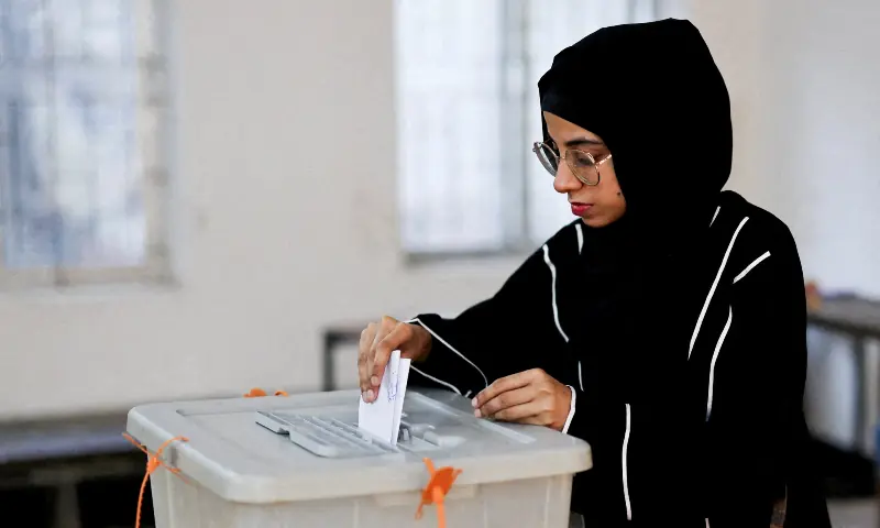 A woman votes in a designated area during the 13th general election in Dhaka, Bangladesh on February 12, 2026. &mdash; Reuters