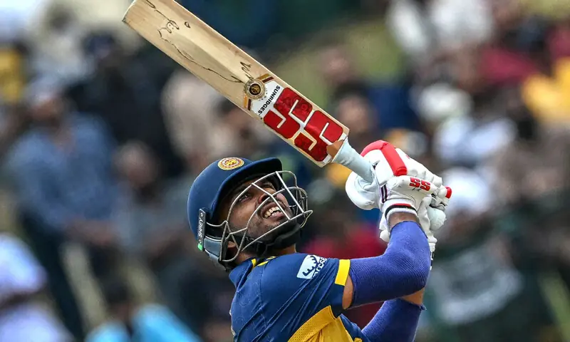 Sri Lanka&rsquo;s captain Dasun Shanaka watches the ball after playing a shot during the 2026 ICC Men&rsquo;s T20 Cricket World Cup group stage match between Sri Lanka and Oman at the Pallekele International Cricket Stadium in Kandy on February 12, 2026. &mdash; AFP
