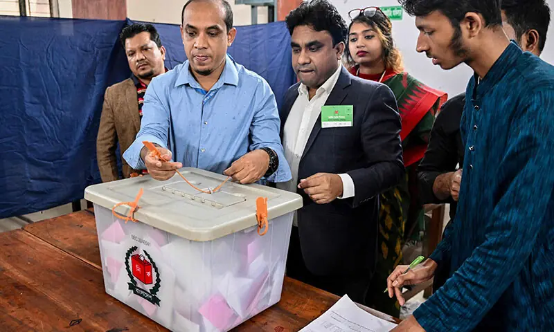 An electoral official seals a ballot box as voting ends at a polling station during Bangladesh&rsquo;s general election in Dhaka on February 12. &mdash; AFP