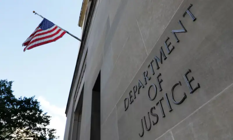 Signage is seen at the United States Department of Justice headquarters in Washington, D.C., US, August 29, 2020. &mdash; Reuters