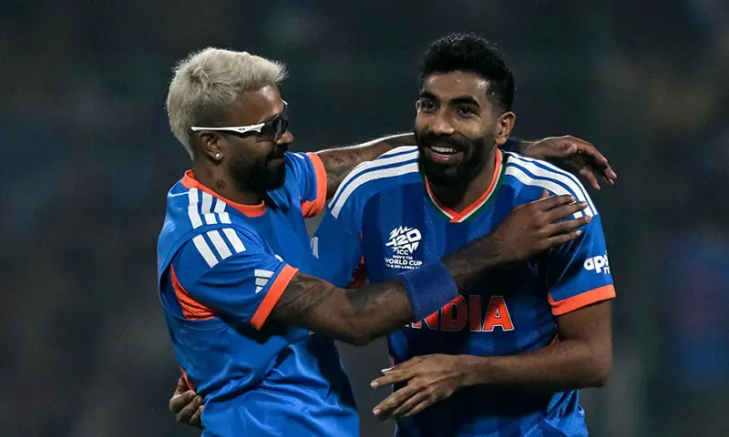 India&rsquo;s Jasprit Bumrah (R) celebrates with teammate Hardik Pandya after taking the wicket of Namibia&rsquo;s Ruben Trumpelmann during the 2026 ICC Men&rsquo;s T20 Cricket World Cup group stage match between India and Namibia at the Arun Jaitley Stadium in New Delhi, India on February 12. &mdash; AFP