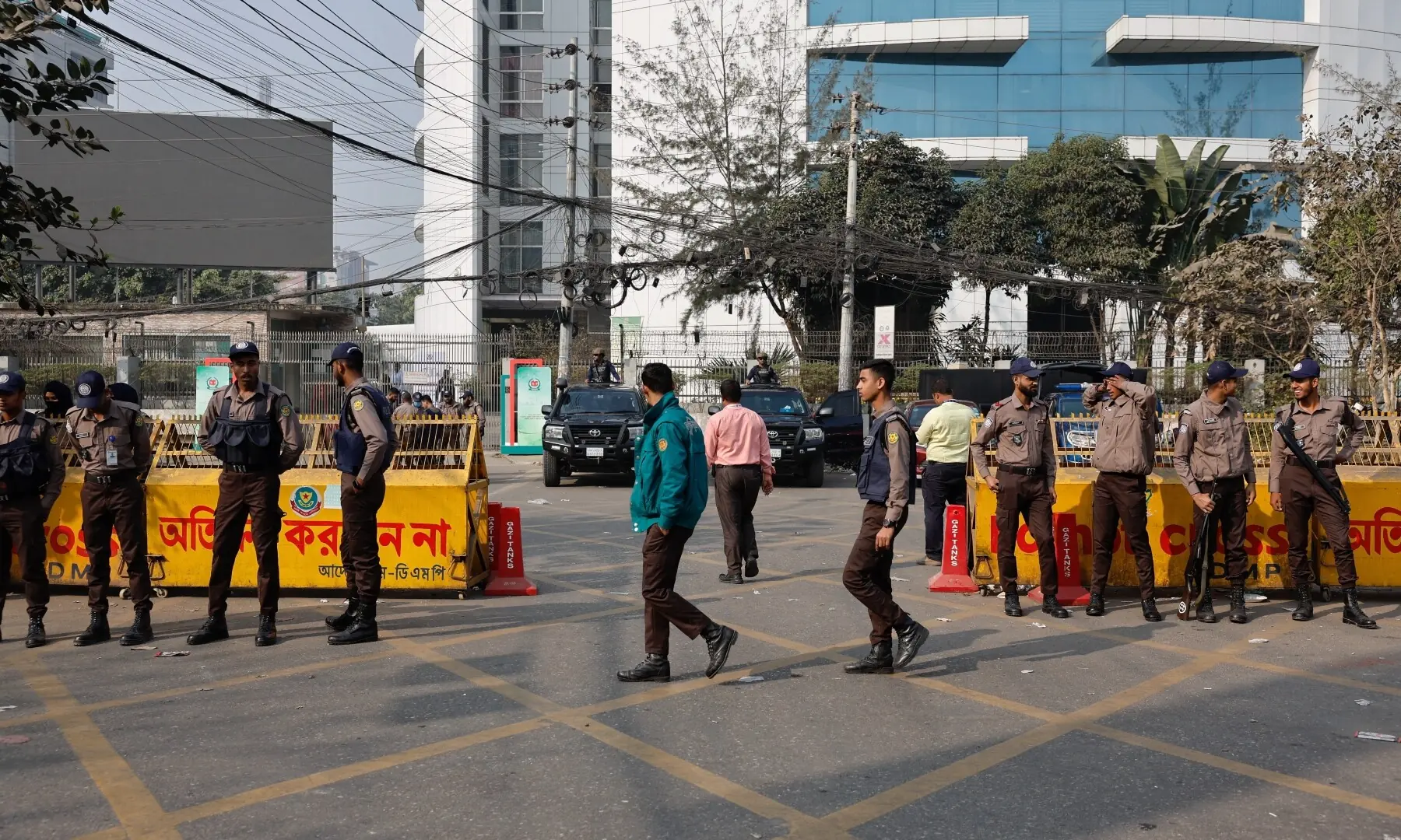 Security personnel stand guard in front of the Election Commission office, a day after the 13th general election, in Dhaka, Bangladesh, February 13, 2026. &mdash;Reuters
