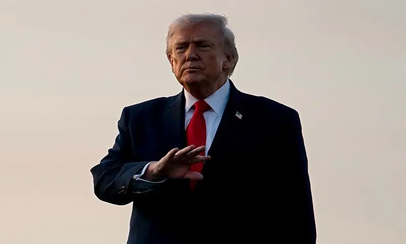 US President Donald Trump gestures to members of the media after exiting Air Force One at Palm Beach International Airport on February 13, 2026 in West Palm Beach, Florida. &mdash; AFP