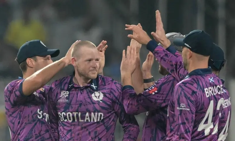 Scotland&rsquo;s Michael Leask (2L) celebrates with teammates after taking the wicket of England&rsquo;s captain Harry Brook during the 2026 ICC Men&rsquo;s T20 Cricket World Cup group stage match between England and Scotland at the Eden Gardens in Kolkata on February 14, 2026. &mdash;AFP