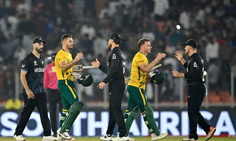 South Africa&rsquo;s captain Aiden Markram (2L) and David Miller (2R) are congratulated by New Zealand&rsquo;s players for their team&rsquo;s win at the end of their 2026 ICC Men&rsquo;s T20 Cricket World Cup group stage match at the Narendra Modi Stadium in Ahmedabad, India on February 14. &mdash; AFP