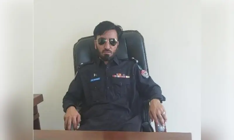 A photo of martyred Additional Station House Officer Gul Mahmood Din. &mdash; Photo via author