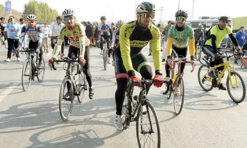 People participate in a bicycle rally in Islamabad on Feb,2020.  &mdash; White Star/File