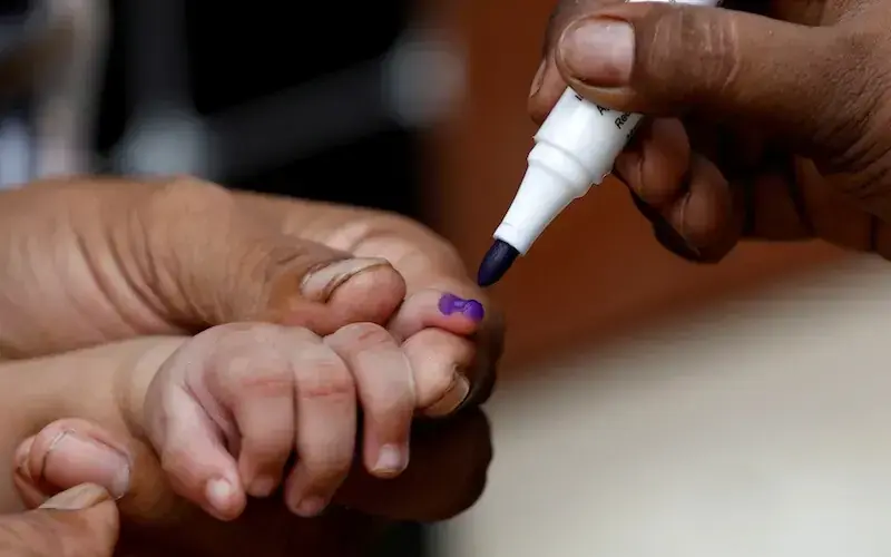 A boy gets his finger marked, after he is administered polio vaccine drops, during an anti-polio campaign, in a low-income neighbourhood in Karachi on July 20, 2020. — Reuters A boy gets his finger marked, after he is administered polio vaccine drops, during an anti-polio campaign, in a low-income neighbourhood in Karachi on July 20, 2020. — Reuters