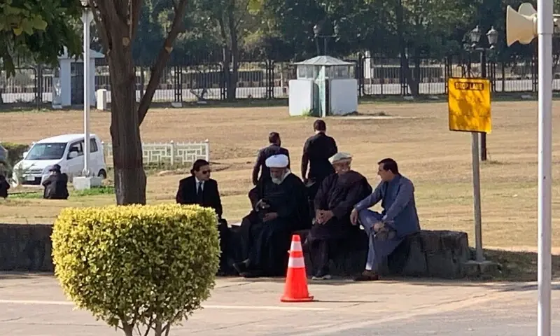 PTI leader Salman Akram Raja, Senator Allama Raja Nasir Abbas, TTAP head Mahmood Khan Achakzai, and PTI Chairman Gohar Ali Khan sitting outside the Parliament House. — Photo via X/@ShandanaGulzar PTI leader Salman Akram Raja, Senator Allama Raja Nasir Abbas, TTAP head Mahmood Khan Achakzai, and PTI Chairman Gohar Ali Khan sitting outside the Parliament House. — Photo via X/@ShandanaGulzar