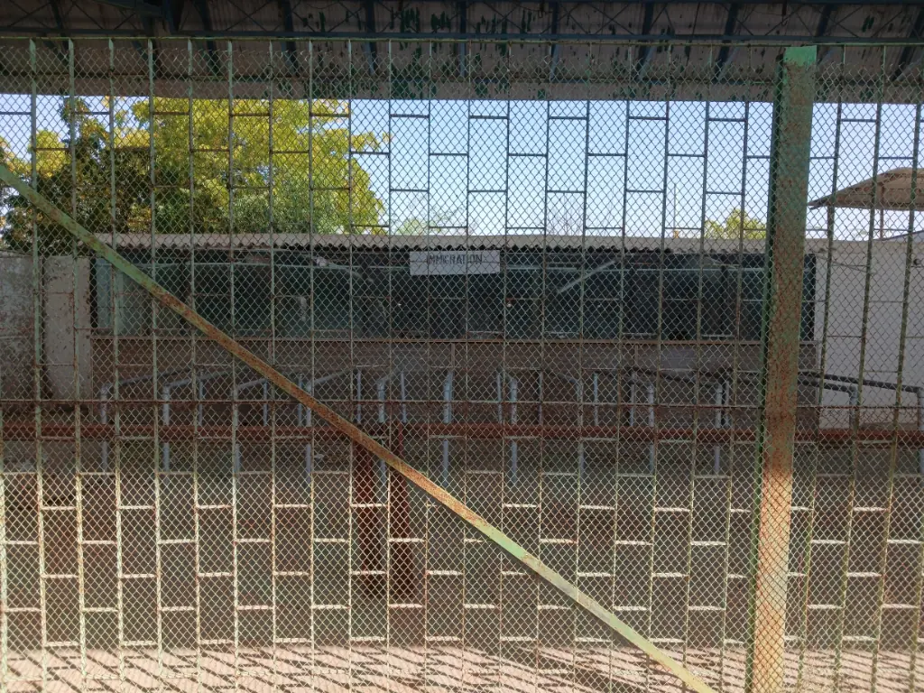 The old immigration counter at Zero Point/Marvi station. Once a hub for cross-border travel, it now sits covered in dust behind a wire fence.