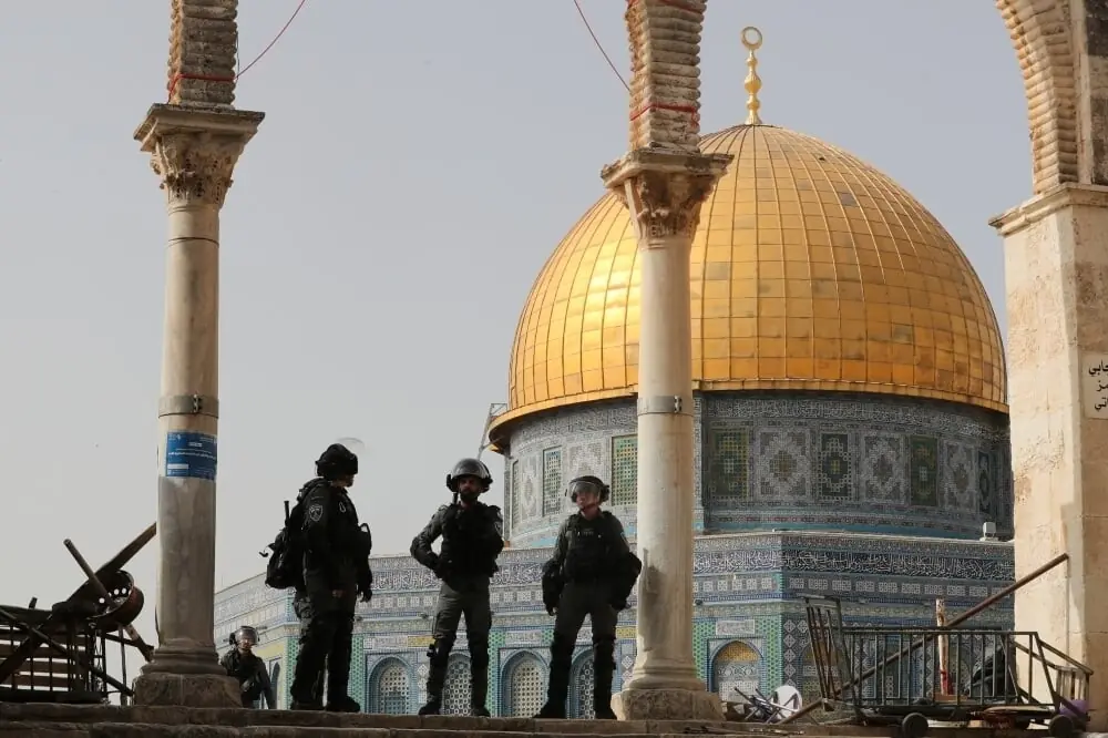 Israeli police stand in front of the Dome of the Rock during violence at the compound that houses Al-Aqsa Mosque, on May 10, 2021. — Reuters Israeli police stand in front of the Dome of the Rock during violence at the compound that houses Al-Aqsa Mosque, on May 10, 2021. — Reuters