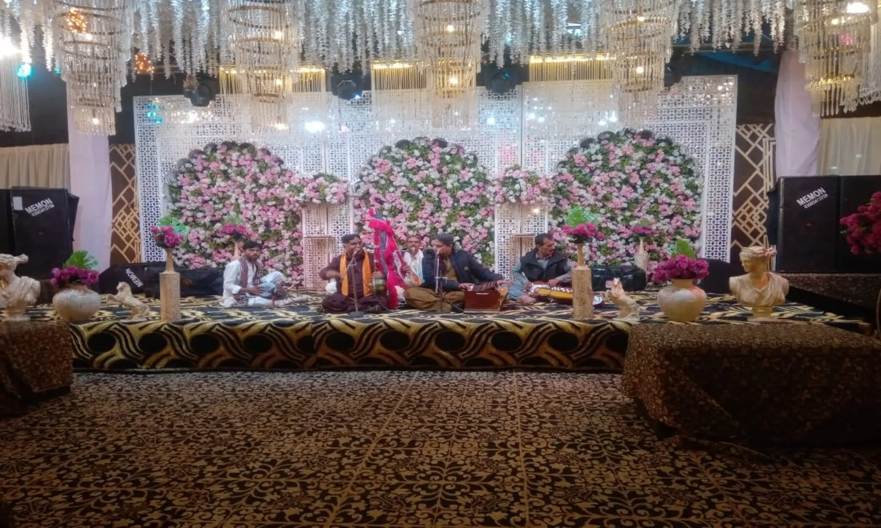 Singers entertaining the audience during the musical night at the STDC guesthouse. &mdash; Author