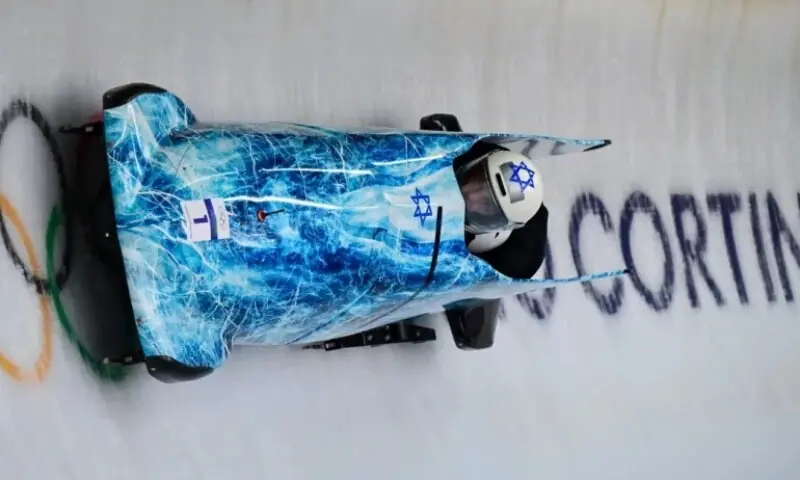 Israel&rsquo;s Adam Edelman pilots in the bobsleigh men&rsquo;s two-man training Heat 4 at Cortina Sliding Centre during the Milano Cortina 2026 Winter Olympic Games in Italy. &mdash;AFP