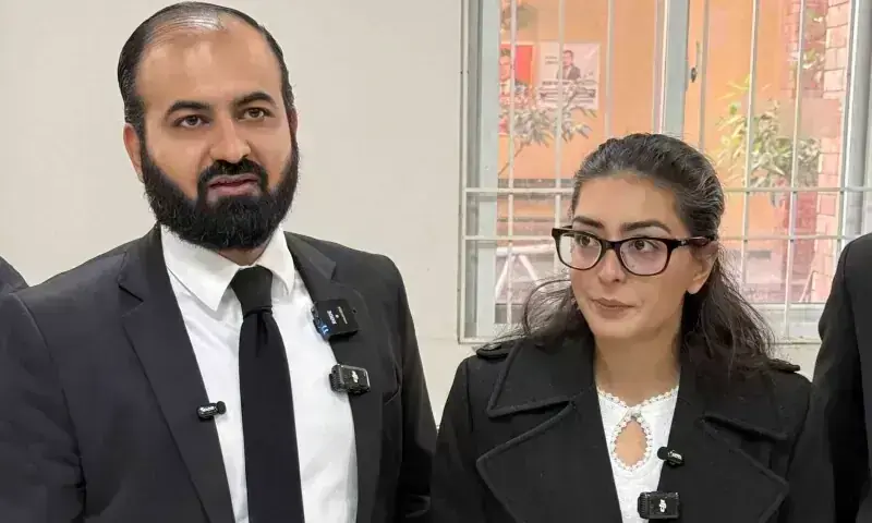 This picture taken on Dec 5, 2025 shows human rights lawyer Imaan Mazari (R) with her husband and fellow lawyer Hadi Ali Chattha (L), during a court hearing in Islamabad. &mdash; AFP/File